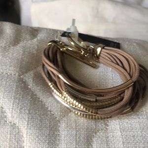Beige gold bracelet.